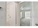 The hallway has doors leading to the bathroom and the bedroom at 2311 Brisbane St # 45, Clearwater, FL 33763
