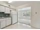 Cozy kitchen adjacent to a spacious living area at 2311 Brisbane St # 45, Clearwater, FL 33763