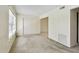 The spacious living room includes lots of natural light and a closet at 2311 Brisbane St # 45, Clearwater, FL 33763