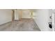 Spacious living room with carpet floors and neutral walls at 2311 Brisbane St # 45, Clearwater, FL 33763