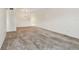 Expansive living room with neutral paint and chandelier at 2311 Brisbane St # 45, Clearwater, FL 33763