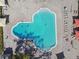 The image showcases a sparkling swimming pool, perfect for relaxation and recreation at 2311 Brisbane St # 45, Clearwater, FL 33763