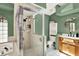 Bathroom area complete with glass shower, tub and vanity with sink at 2454 Shadecrest Rd, Land O Lakes, FL 34639