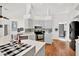 Kitchen featuring stainless steel appliances, white counter tops, and hardwood floors at 2454 Shadecrest Rd, Land O Lakes, FL 34639
