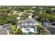 Aerial view showcasing the backyard with pool and manicured landscaping, highlighting the property's prime location at 2819 Safe Harbor Dr, Tampa, FL 33618