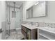 Modern bathroom with glass shower, sleek vanity, and stylish tile accents at 2819 Safe Harbor Dr, Tampa, FL 33618