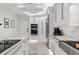 Bright kitchen featuring marble countertops, stainless steel appliances, and ample cabinet space at 2819 Safe Harbor Dr, Tampa, FL 33618