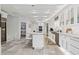 Modern kitchen featuring marble countertops, stainless steel appliances, and custom cabinetry at 2819 Safe Harbor Dr, Tampa, FL 33618