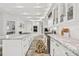 Modern kitchen featuring marble countertops, stainless steel appliances, and an open layout at 2819 Safe Harbor Dr, Tampa, FL 33618
