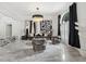 Elegant living room featuring marble floors, stylish decor, and a stunning chandelier at 2819 Safe Harbor Dr, Tampa, FL 33618