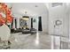 Bright, open-concept living room featuring high ceilings, marble floors, and elegant decor at 2819 Safe Harbor Dr, Tampa, FL 33618