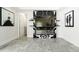 Modern fireplace with a sleek design and black and white accents on marble floors at 2819 Safe Harbor Dr, Tampa, FL 33618