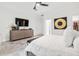 Well-appointed bedroom featuring a modern dresser and stylish decorations at 2819 Safe Harbor Dr, Tampa, FL 33618