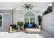Outdoor patio featuring comfortable seating and ceiling fan for relaxing and entertaining at 2819 Safe Harbor Dr, Tampa, FL 33618
