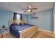 Calming bedroom with wood floors, ceiling fan and a beautiful view to the ocean at 3212 34Th N Ave, St Petersburg, FL 33713