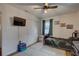 Bedroom with a black accent bed, closet, television, and natural light at 3212 34Th N Ave, St Petersburg, FL 33713