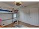 Charming bedroom featuring a loft bed, a double door closet, and wood flooring at 3212 34Th N Ave, St Petersburg, FL 33713