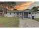 Charming single-story home with a carport and a well-maintained front yard at 3212 34Th N Ave, St Petersburg, FL 33713
