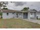 Charming single-story home with a carport and a well-maintained front yard at 3212 34Th N Ave, St Petersburg, FL 33713