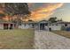 Charming single-story home with a carport and a well-maintained front yard at 3212 34Th N Ave, St Petersburg, FL 33713