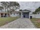 Charming single-story home with a carport and a well-maintained front yard at 3212 34Th N Ave, St Petersburg, FL 33713