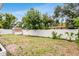 Spacious backyard featuring well maintained vinyl fencing, and storage shed providing secure private outdoor space at 3381 19Th Sw Pl, Largo, FL 33774