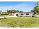 Well-maintained single-story home with lush green lawn at 3381 19Th Sw Pl, Largo, FL 33774
