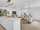 Open-concept living space flows seamlessly from the kitchen to the living room, great for entertaining at 3381 19Th Sw Pl, Largo, FL 33774