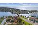 An aerial shot of the neighborhood's beautiful waterfront homes, a bridge, and ocean views at 3415 Overlook Ne Dr, St Petersburg, FL 33703