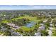 Wide aerial shot of a neighborhood park featuring well-maintained tennis and pickleball courts and baseball field at 3415 Overlook Ne Dr, St Petersburg, FL 33703
