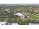 Aerial view shows a commercial building with parking and surrounding green spaces at 3415 Overlook Ne Dr, St Petersburg, FL 33703