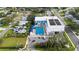 An elevated view of the property and its outdoor pool, playground, and solar panels at 3415 Overlook Ne Dr, St Petersburg, FL 33703