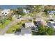 Aerial view of a charming neighborhood near the water with mature trees at 3415 Overlook Ne Dr, St Petersburg, FL 33703