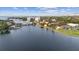 Breathtaking waterfront community view with homes, bridge, and lush landscape at 3415 Overlook Ne Dr, St Petersburg, FL 33703