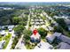 An elevated view of the neighborhood and surrounding lush greenery near the waterfront at 401 Windrush Bay Dr, Tarpon Springs, FL 34689