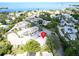 An aerial view of the property highlighting the neighborhood and proximity to the bay at 401 Windrush Bay Dr, Tarpon Springs, FL 34689
