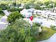 An aerial view showing the property location in relation to surrounding buildings at 401 Windrush Bay Dr, Tarpon Springs, FL 34689