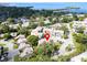A clear aerial view showing the building and the community layout near the water at 401 Windrush Bay Dr, Tarpon Springs, FL 34689