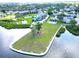 An aerial view of green space and pool showcasing the community's beautiful waterfront location at 401 Windrush Bay Dr, Tarpon Springs, FL 34689