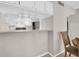 Bright kitchen featuring white cabinets, modern appliances, and a convenient breakfast bar at 401 Windrush Bay Dr, Tarpon Springs, FL 34689