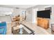 Inviting living room with tile floors, dining area, and comfortable seating at 401 Windrush Bay Dr, Tarpon Springs, FL 34689
