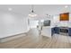 A modern kitchen featuring sleek countertops, stainless steel appliances, and contemporary lighting fixtures at 412 Mira Vista Dr, Dunedin, FL 34698