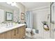 Stylish bathroom with a modern vanity, subway tile shower, and elegant decor at 415 Island Way # 507, Clearwater Beach, FL 33767