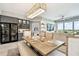This dining room features a view of the city skyline, and it includes a dining room table at 415 Island Way # 507, Clearwater Beach, FL 33767