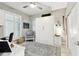 Multi-purpose room that can be used as an office, featuring a murphy bed and natural light at 415 Island Way # 507, Clearwater Beach, FL 33767