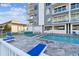 Condominium pool and hot tub with comfortable lounge seating at 415 Island Way # 507, Clearwater Beach, FL 33767