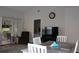 Living room with slider to lanai, and view to the Primary Bedroom at 4206 Revere Cir, New Port Richey, FL 34653