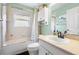 Bathroom featuring a shower and tub combination and ample natural light, providing a serene and functional space at 4510 Beaumaris Dr, Land O Lakes, FL 34638