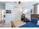 Cozy bedroom featuring a ceiling fan, ample closet space, and a tranquil ambiance, perfect for unwinding at 4510 Beaumaris Dr, Land O Lakes, FL 34638