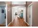 Inviting entryway featuring hardwood floors, decorative arches, and views to the backyard at 4510 Beaumaris Dr, Land O Lakes, FL 34638